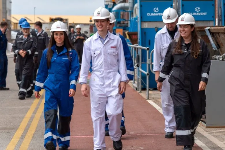 Engineers walking and smiling 